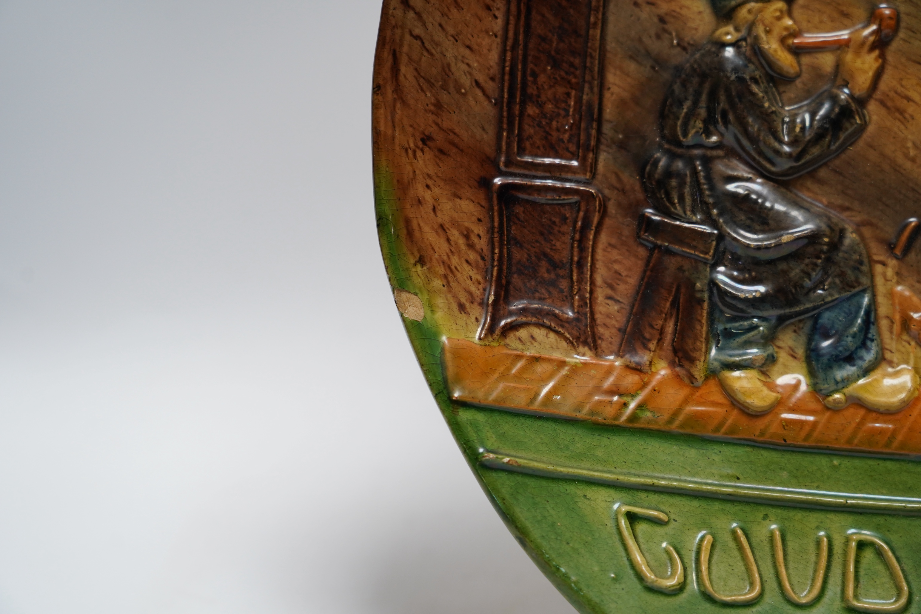 A Dutch pottery proverb plate, circa 1900, 31cm